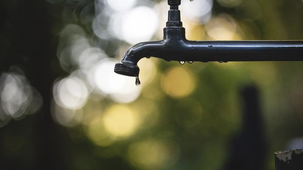 Water dripping from an outdoor tap
